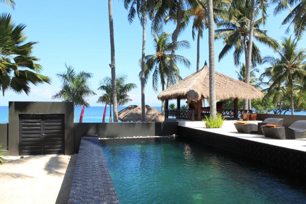 Qunci Villas Resort Mangsit Exterior photo